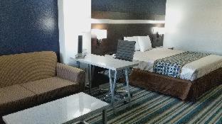 Homebridge Inn And Suites Бомонт Стая снимка
